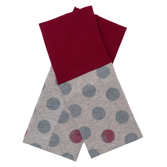 Armstulpen in Grau und Rot mit hellblauen großen Punkten.